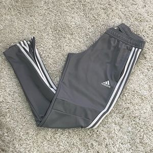 Adidas Tiro Pants in Grey with White Stripes in Women’s Small.